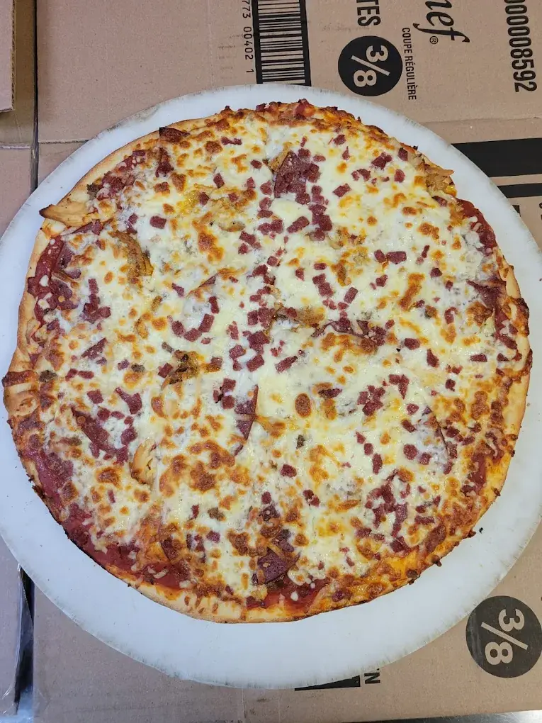 Delicious Meat Lovers Pizza at The Donair Guys in Edmonton, AB